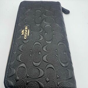 Like New Coach Accordion Zip Wallet in Signature Black Embossed Leather